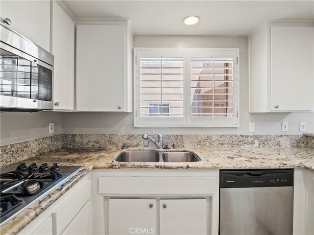 4301 Fulton Ave Unit 303, Sherman Oaks, CA 91423 - kitchen with stainless steel appliances, a sink, white cabinetry, and light stone countertops