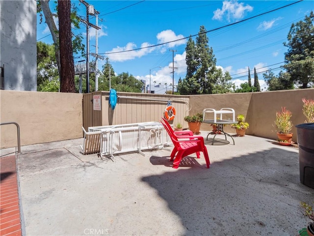 4301 Fulton Ave Unit 303, Sherman Oaks, CA 91423 - view of patio / terrace featuring fence