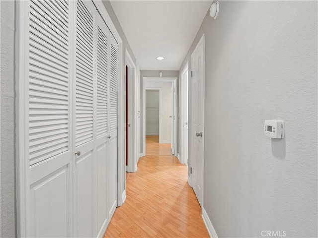 4301 Fulton Ave Unit 303, Sherman Oaks, CA 91423 - hallway with baseboards, light wood-style floors, and recessed lighting