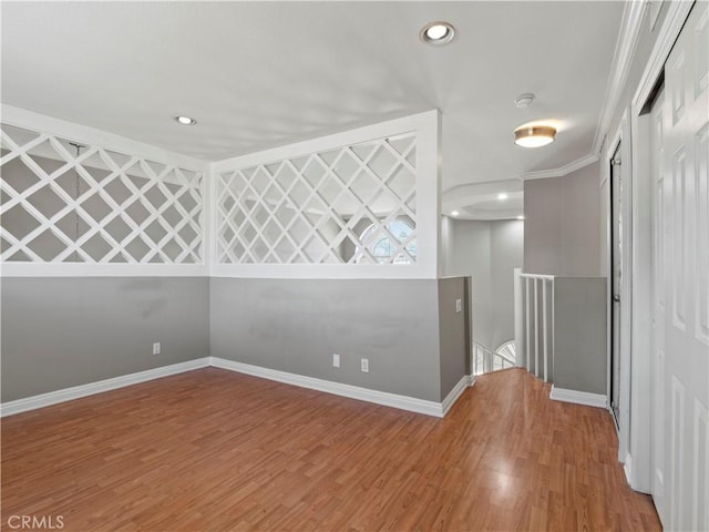 4301 Fulton Ave Unit 303, Sherman Oaks, CA 91423 - spare room featuring baseboards, wood finished floors, recessed lighting, a smoke detector, and crown molding