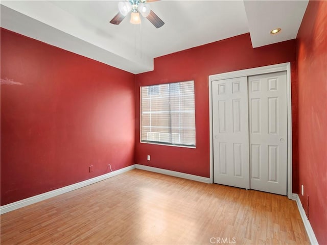 4301 Fulton Ave Unit 303, Sherman Oaks, CA 91423 - unfurnished bedroom featuring wood finished floors, a closet, baseboards, and a ceiling fan