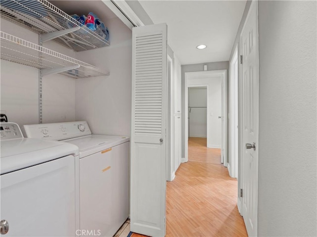4301 Fulton Ave Unit 303, Sherman Oaks, CA 91423 - laundry area featuring separate washer and dryer, light wood-style floors, recessed lighting, and baseboards