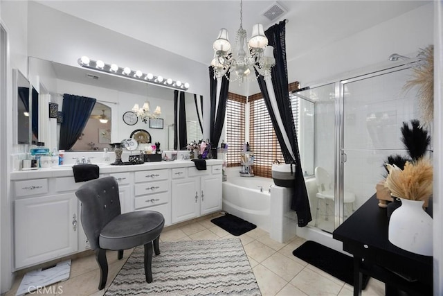 bathroom featuring an inviting chandelier, double vanity, tile patterned flooring, visible vents, and a bath