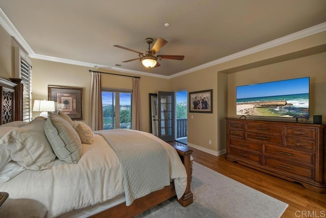 bedroom featuring ceiling fan, access to exterior, baseboards, wood finished floors, and ornamental molding