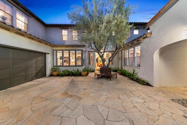 view of patio with a garage