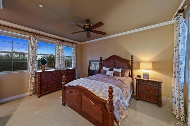 bedroom featuring baseboards, crown molding, and light colored carpet