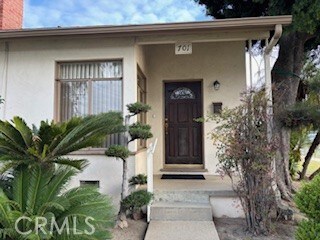 701 W Knepp Ave, Fullerton, CA 92832 - entrance to property with stucco siding and a chimney