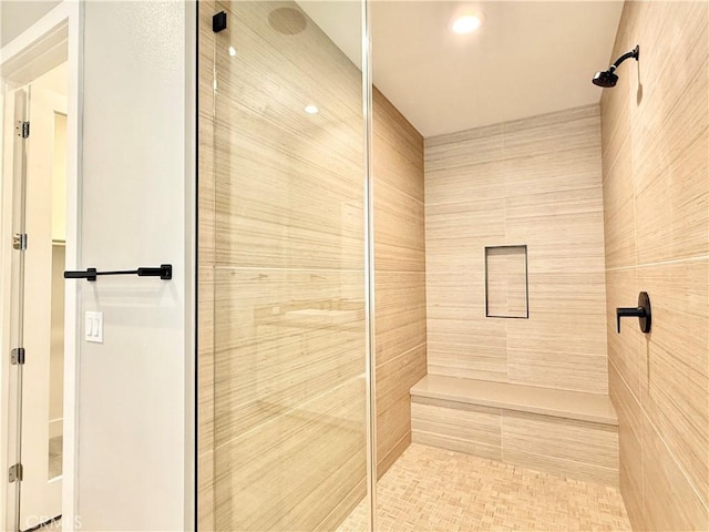 bathroom featuring a shower stall