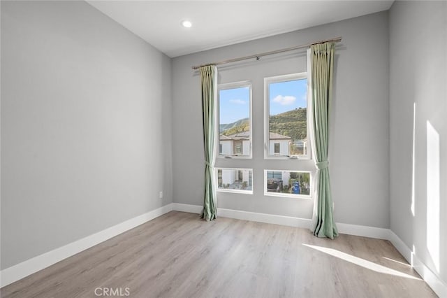 20526 W Overlook Ct, Porter Ranch, CA 91326 - unfurnished room with wood finished floors, baseboards, and recessed lighting