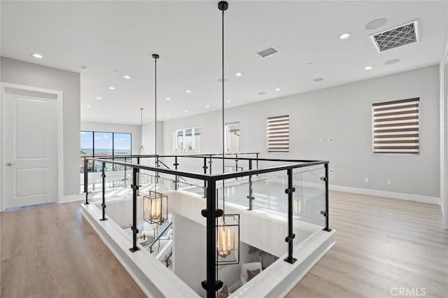 20526 W Overlook Ct, Porter Ranch, CA 91326 - hall featuring an upstairs landing, light wood-style flooring, baseboards, and recessed lighting