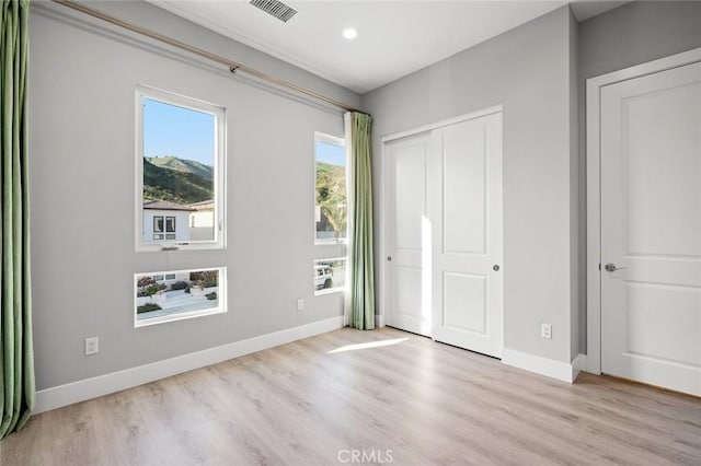 20526 W Overlook Ct, Porter Ranch, CA 91326 - unfurnished bedroom with light wood finished floors, baseboards, and recessed lighting