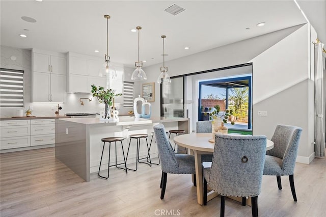 20526 W Overlook Ct, Porter Ranch, CA 91326 - dining area featuring light wood-type flooring and recessed lighting