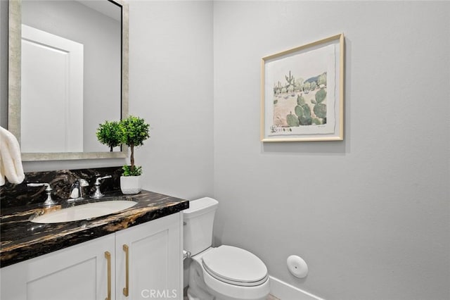 20526 W Overlook Ct, Porter Ranch, CA 91326 - half bathroom featuring vanity, toilet, and baseboards