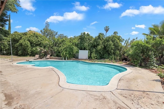 pool featuring a patio