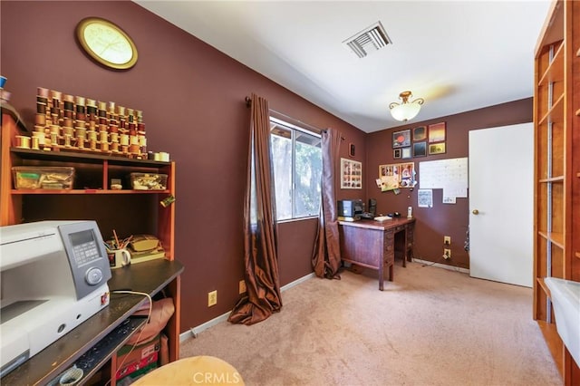 office featuring baseboards, carpet, and visible vents