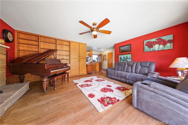 120 Franklin Ave, Redlands, CA 92373 - living room featuring ceiling fan, light wood-style flooring, a textured ceiling, and built in features