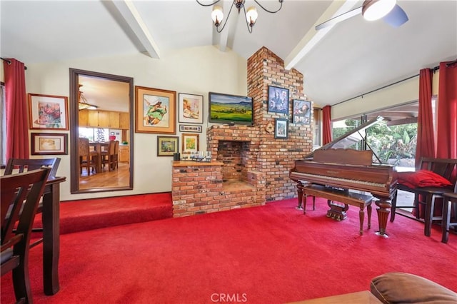 sitting room featuring lofted ceiling with beams, carpet, and ceiling fan with notable chandelier