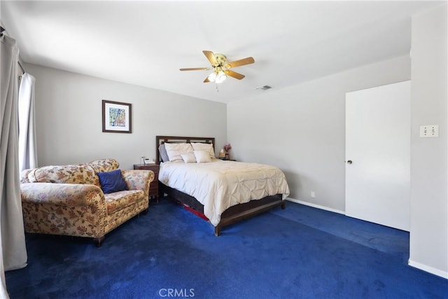 bedroom featuring visible vents, carpet flooring, baseboards, and a ceiling fan