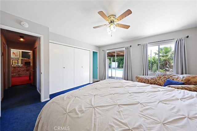 bedroom featuring access to outside, a ceiling fan, carpet, and a closet