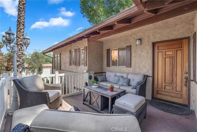 view of patio / terrace featuring outdoor lounge area and a wooden deck