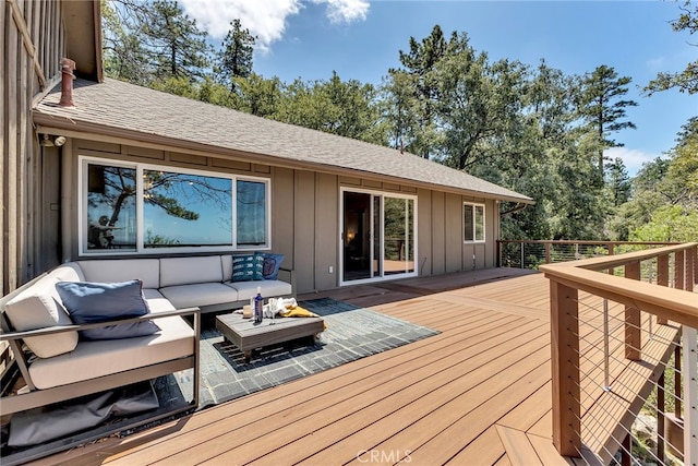 wooden deck with an outdoor hangout area