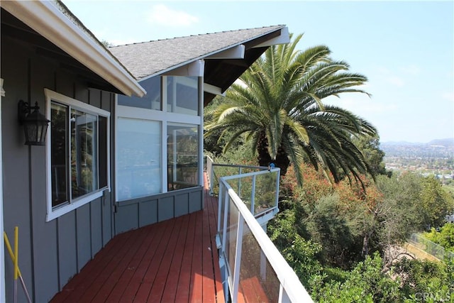 deck with a sunroom