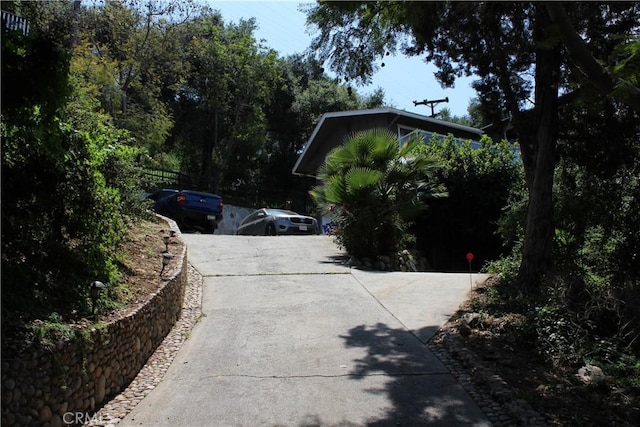 view of street featuring driveway