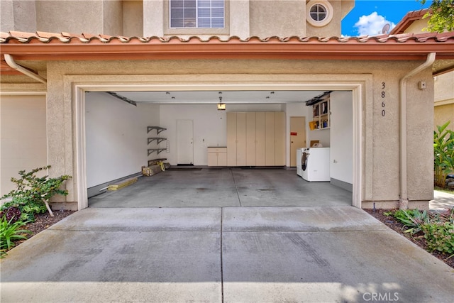 garage featuring driveway