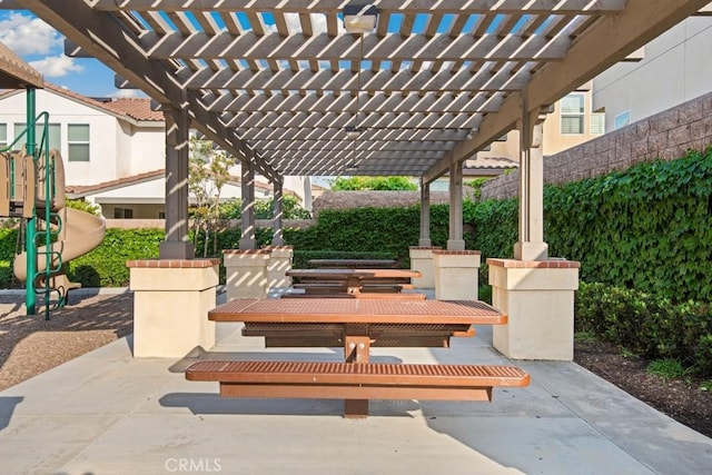 view of patio / terrace featuring a pergola and outdoor dining area