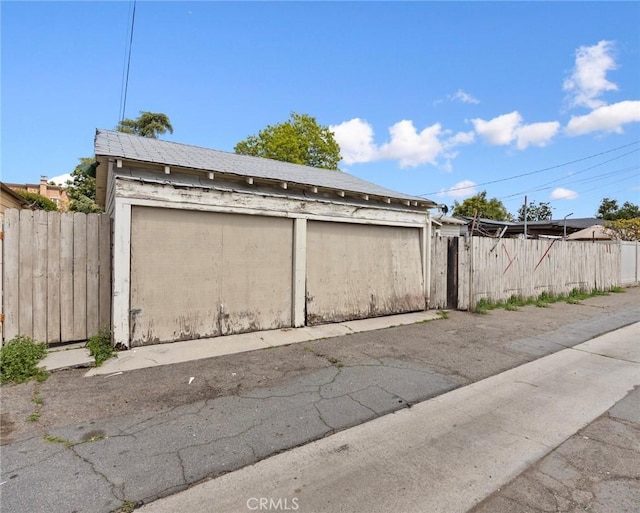 garage with fence