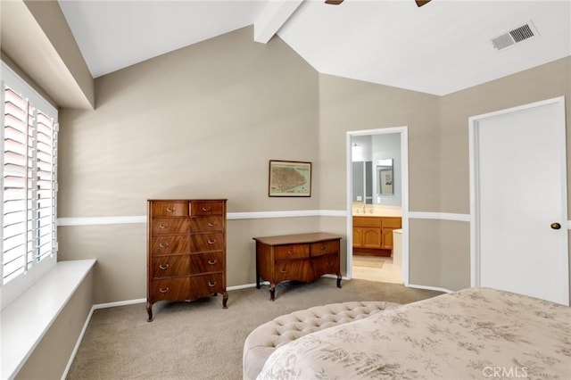 bedroom with visible vents, baseboards, vaulted ceiling with beams, and light colored carpet
