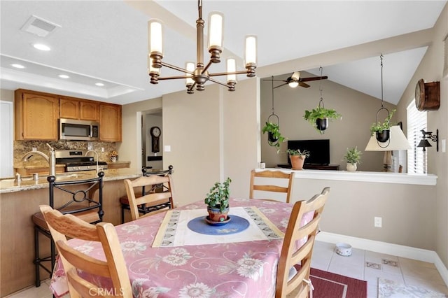 dining area featuring ceiling fan with notable chandelier, recessed lighting, baseboards, light tile patterned floors, and visible vents