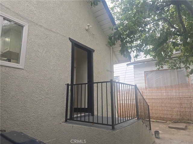 3311 E 4th St, Los Angeles, CA 90063 - view of side of home with fence and stucco siding