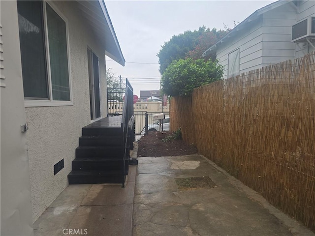 3311 E 4th St, Los Angeles, CA 90063 - view of side of home with stucco siding and fence