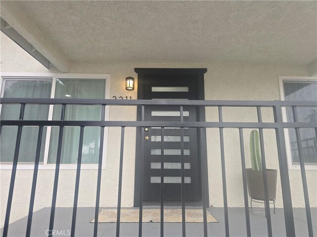 3311 E 4th St, Los Angeles, CA 90063 - property entrance with stucco siding