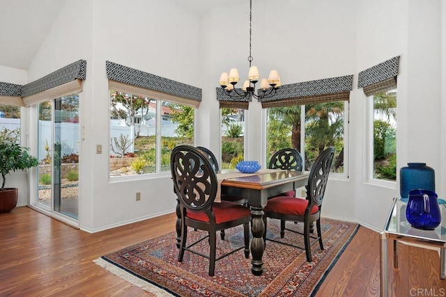 4078 Lemnos Way, Oceanside, CA 92056 - dining space featuring high vaulted ceiling, a chandelier, and wood finished floors