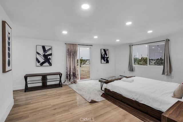 3737 Meriwether Rd Unit 29, Palms, CA 92277 - bedroom featuring multiple windows, recessed lighting, and wood finished floors