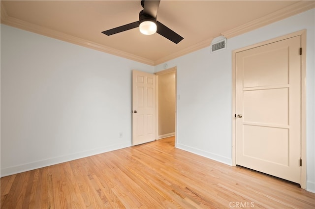 5449 E Fairbrook St, Long Beach, CA 90815 - unfurnished bedroom with crown molding, ceiling fan, baseboards, light wood-type flooring, and visible vents
