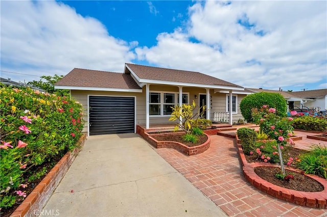 5449 E Fairbrook St, Long Beach, CA 90815 - ranch-style home with a garage, driveway, and covered porch