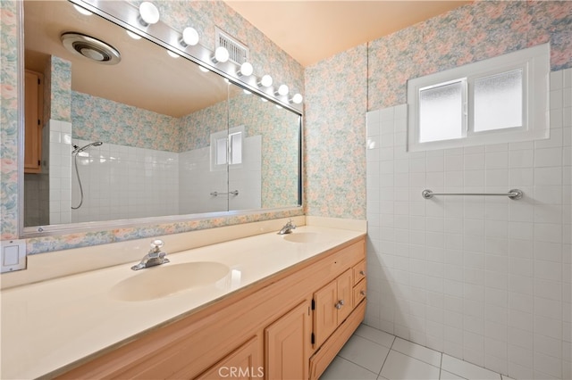 5449 E Fairbrook St, Long Beach, CA 90815 - bathroom with tile patterned flooring, a sink, a tile shower, and double vanity