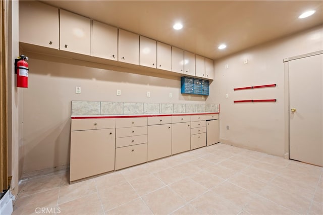 5449 E Fairbrook St, Long Beach, CA 90815 - kitchen with recessed lighting, white cabinetry, and light tile patterned flooring