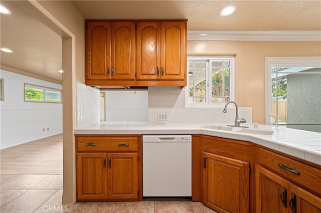 5449 E Fairbrook St, Long Beach, CA 90815 - kitchen featuring white dishwasher, ornamental molding, brown cabinetry, and a sink