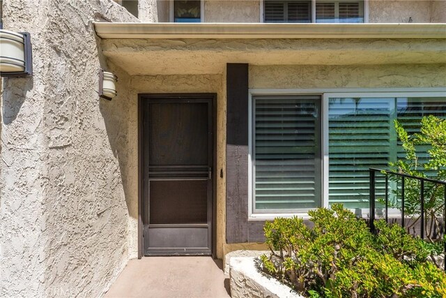 4321 Matilija Ave Unit 9, Sherman Oaks, CA 91423 - view of exterior entry featuring stucco siding