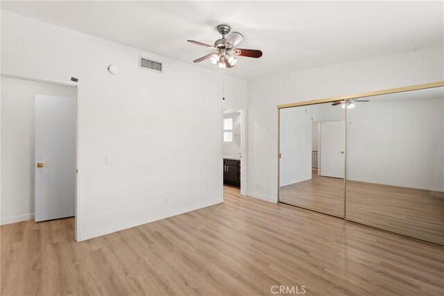 4321 Matilija Ave Unit 9, Sherman Oaks, CA 91423 - unfurnished bedroom with wood finished floors, a closet, ceiling fan, and connected bathroom