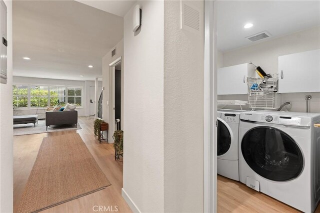 4321 Matilija Ave Unit 9, Sherman Oaks, CA 91423 - laundry room with washer and dryer, light wood-style floors, and recessed lighting