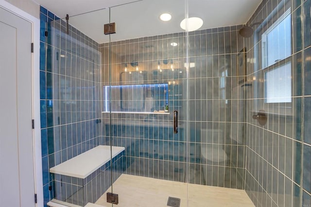 full bathroom with recessed lighting and a stall shower