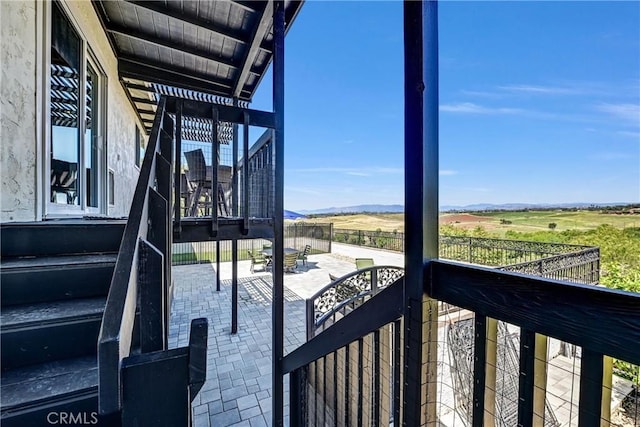 exterior space featuring a patio area and a rural view