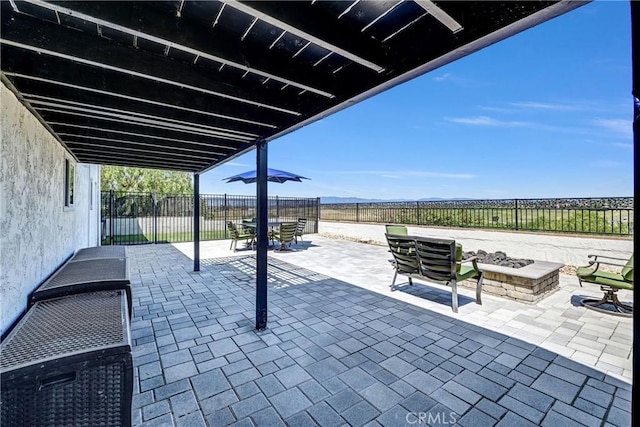 1864 Winterwarm Dr, Fallbrook, CA 92028 - fenced backyard with a patio area, outdoor dining area, and a fire pit