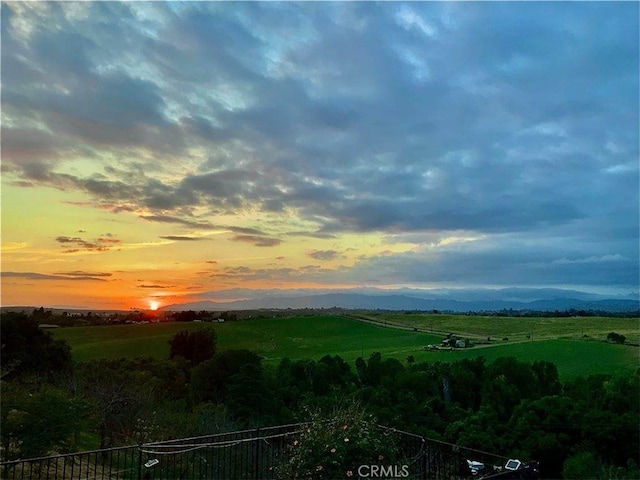 property view of mountains featuring a rural view