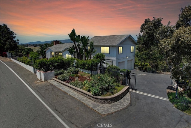 1864 Winterwarm Dr, Fallbrook, CA 92028 - view of front of property with driveway, an attached garage, and a gate